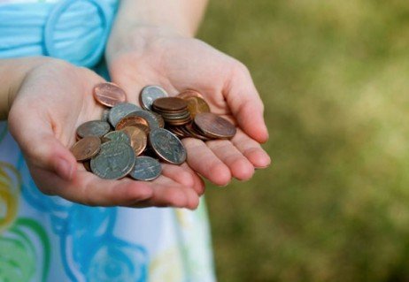 Trocados que são economizados para realizar seus sonhos